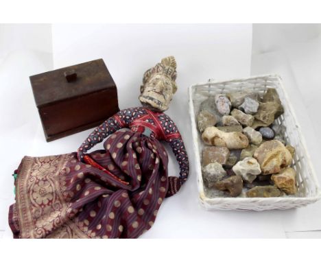 A collectors' lot comprising carved wooden Javanese puppet, a tea caddy of simple form and a quantity of mineral samples.