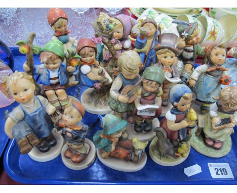 Hummel Figures, including 'Feeding Time', 'Apple Tree Girl' and 'Boy', fourteen, some with faults.