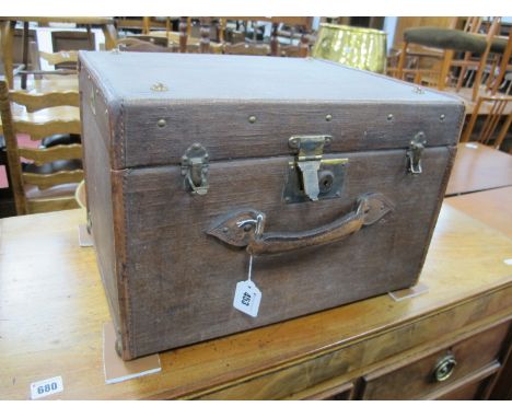 A Circa Early XX Century Travelling Trunk, bearing flying stork triangular makers logo, initialled "T.W.W.", red lined, 44.5c
