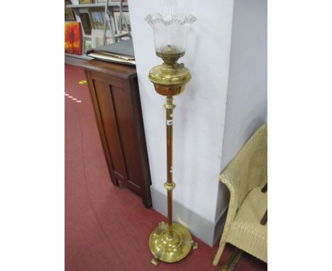 Brass Standard Lamp, of circular form, on three decorative feet, complete with etched glass shade and funnel.