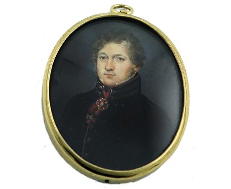 λ Circle of Jean-Baptiste Jacques AugustinPortrait miniature of a gentleman, wearing a black coat with a medal around his nec