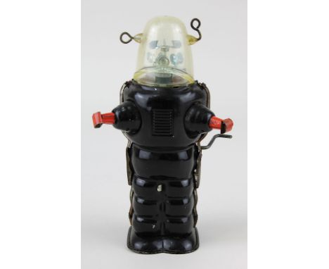 Robby the Robot, Blechroboter, Japan um 1950, schwarz lackiert, bespielter Zustand, Mechanik funktioniert, Höhe 16,5 cm. 3571