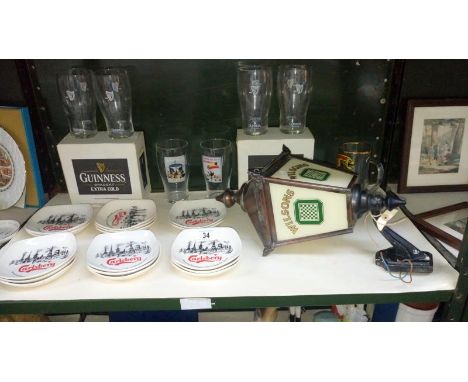A mixed lot of brewery items including wall lantern