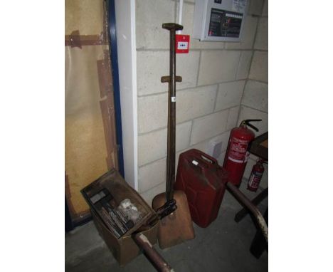 A garden spade, garden fork, large fuel can, tools including drill bits etc