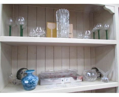 A mixed lot of glassware including Goebel figure of an eagle (2 shelves)