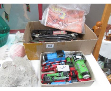 A Hornby Toy Story 3 part train set and a quantity of ERTL Thomas the Tank Engine train items