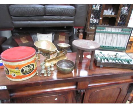 A mixed lot including canteen of cutlery, scales, old tins etc