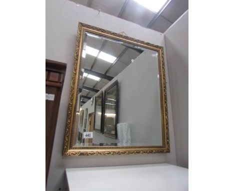 A gilt framed bevel edged mirror