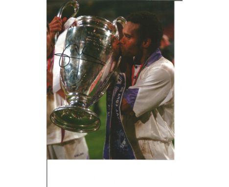 Christian Karembeu Signed Real Madrid European Cup 8x10 Photo. Good Condition. All signed pieces come with a Certificate of A