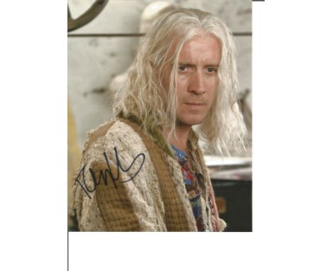 Rhys Ifans signed 10 x 8 colour portrait photo. Good Condition. All signed pieces come with a Certificate of Authenticity. We