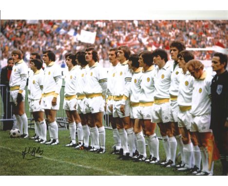 John Giles 1975 Football Autographed 12 X 8 Photo, A Superb Image Depicting Leeds United Players Standing Shoulder To Shoulde