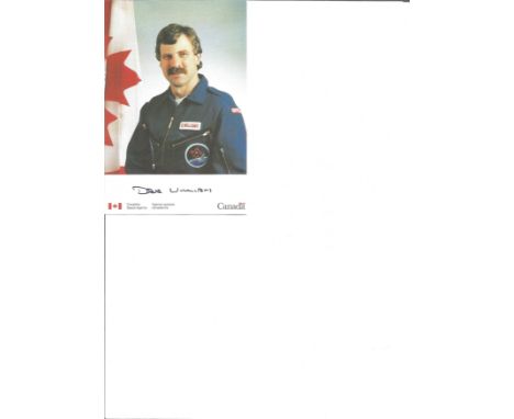 Astronaut Canadian Dave Williams NASA signed 6 x 4 colour photo, light crease and paper clip mark. Good Condition. All signed