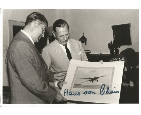 Jet engine pioneer Hans von Ohain signed 6 x 4 inch b w photo showing a picture to Werhner von Braun. Good Condition. All sig
