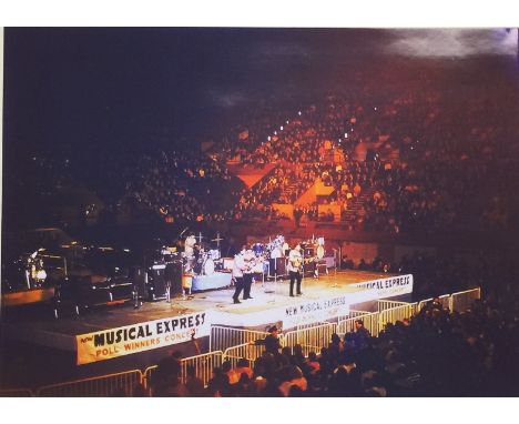 BEATLES POLL WINNERS CONCERT 1963 PHOTOGRAPH WITH COPYRIGHT. A 35mm transparency of an image depicting The Beatles on stage a
