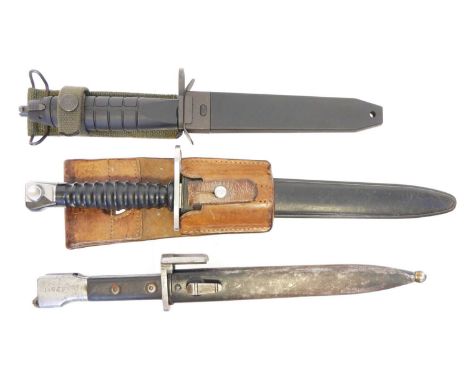 Three bayonets and scabbards Three bayonets and scabbards, to include a Swiss Sig M 1957 bayonet, Belgian FN FAL bayonet and 