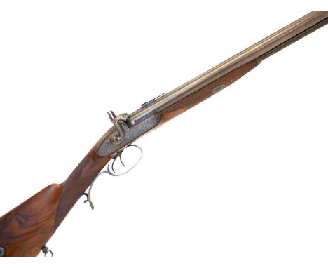 Percussion 24 bore double barrel rifle Percussion 24 bore double barrel rifle, 30 inch Damascus barrels fitted with a modern 