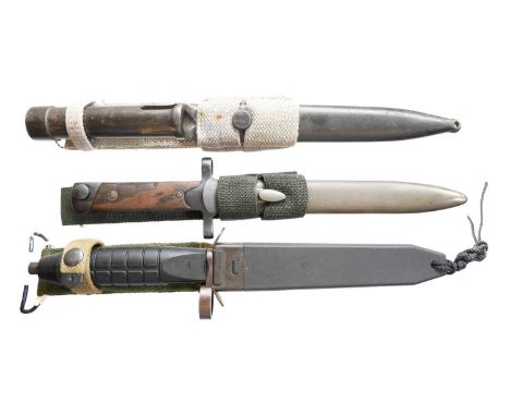 Three bayonets and scabbards Three bayonets and scabbards, to include an Italian M.1938 Carcarno  bayonet, scabbard and frog,