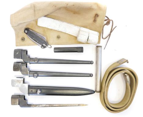 Four Lee Enfield No.4 bayonets and accessories.  Four Lee Enfield No.4 bayonets three spike and one blade, two oil bottles, c