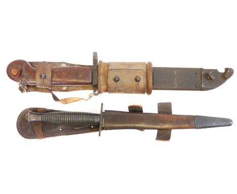 Fairbairn Sykes dagger and an AKM / AK47 bayonet and scabbard. Fairbairn Sykes dagger and scabbard, the guard stamped William