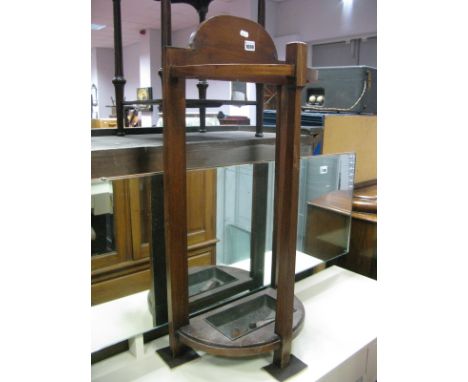 An Early XX Century Mahogany Demi Lune Stick Stand, complete with galvanised drip tray.