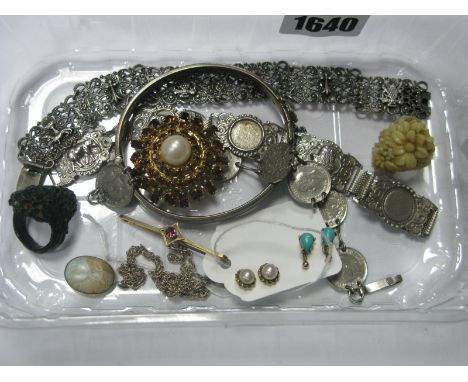 A Hallmarked Silver Bangle, hinged to snap clasp, two souvenir panel bracelets, a 1920's/30's three piece coin bracelet, pend