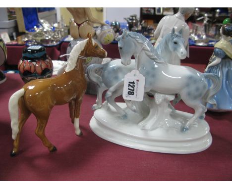 Goebel Figure of a Horse, together with Gerold Porzellan Western Germany figure group of two horses. (2)