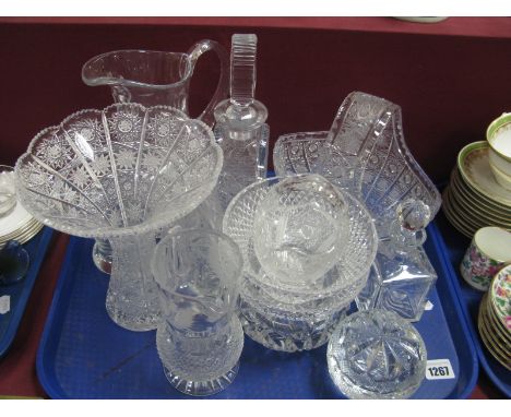 A Fine Cut Lead Crystal Decanter of Flask Form, a similar waisted vase, jugs, dishes, paperweight etc:- One Tray