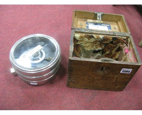 A Chrome Cased Pigeon Clock, No. 99641, in fitted oak case.