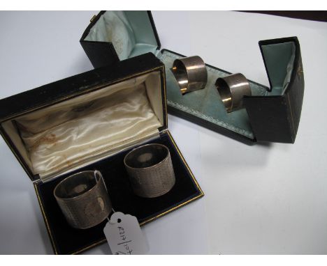 A Matched Pair of  Hallmarked Silver Napkin Rings, Goldsmiths &amp; Silversmiths Co Ltd, London 1917, 1918, allover engine tu