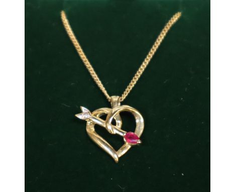 14ct gold cupids arrow brooch set with rubies and diamonds.  Approx weight 4.3 grams.(B.P. 21% + VAT) 