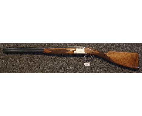 Browning FN double barrelled 12 bore over and under sporting shotgun having single trigger ejector action with selective safe