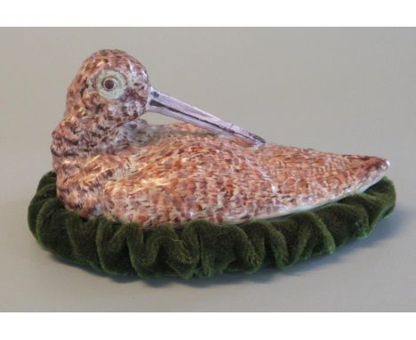 Ceramic egg crock cover in the form of a woodcock on a velvet base.(B.P. 21% + VAT) 