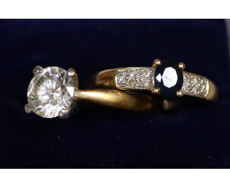 9ct gold sapphire and diamond ring and a 9ct gold cz solitaire ring.  Both ring size O.  Approx weight in total 5 grams.(B.P.