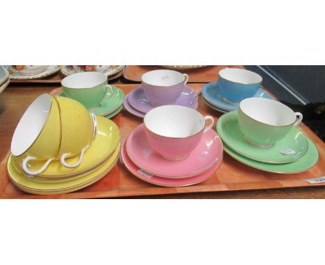 Tray of Royal Worcester trios of various colours with gilt rims. (7 trios)(B.P. 21% + VAT) 
