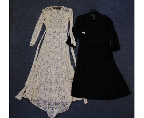 1940's long black crepe dress with 'Lucy Lane OS Model' label, together with a cream lace 1940's wedding dress. (2)(B.P. 21% 