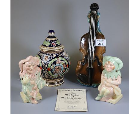 Royal Doulton 'The Jester' D7109, and 'The Lady Jester' D7110, Toby jugs with certificate of authenticity together with a Con