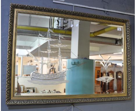 Large bevelled glass rectangular mirror with etched and engraved sailing galleon decoration within gilt frame. 105 x 70 cm ov