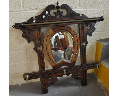 Edwardian design horse shoe wall mirror with coat hooks and rail. (B.P. 21 + VAT) 