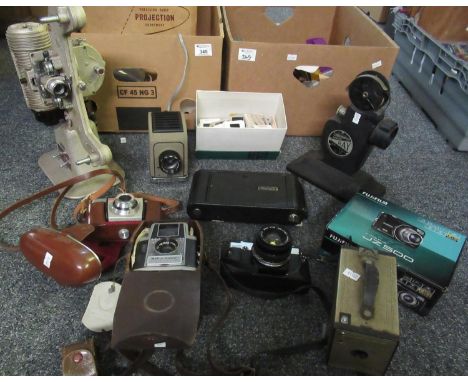 Two boxes of assorted photographic equipment to include: G. B. Bell & Howell 8mm projector model 606H, box of slides tourist,