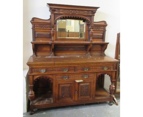Late Victorian oak two stage mirror back foliate carved sideboard.(B.P. 21% + VAT) 