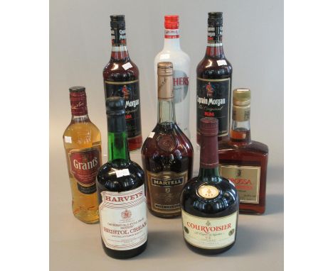 Collection of alcoholic spirits to include two bottles Captain Morgan the original rum, V.S. Fine Cognac Martell, Courvoisier