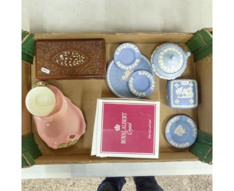 Five pieces of Wedgwood jasperware in powder blue, with a blue and white Queens Ware lidded sugar bowl, carved Indian wooden 