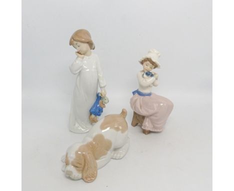Three Nao Figures to include, Puppy Playing, Girl Holding Puppy, and Girl Carrying Doll. Tallest 20cm Height (3)