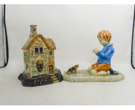 Two ceramic items designed by Beswick Designer Albert Hallam of boy playing with frog together with gloss model of a house bo