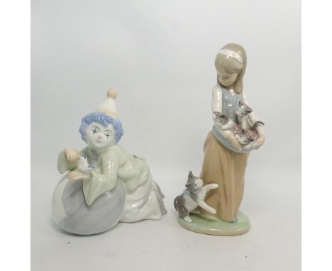 Two Lladro figurines, a Girl with Kittens and a Clown with a small bird, height of tallest 24cm (2)