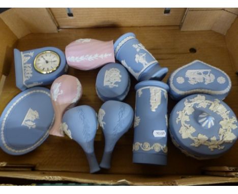Wedgwood jasperware items, mostly in powder blue including a mantel clock, plus two pink vases, eleven pieces (1 tray).