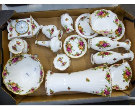 Royal Albert Old Country Roses pattern items to include a large vase, mantle clock, 2 Dorothy boxes, shaped dishes and small 