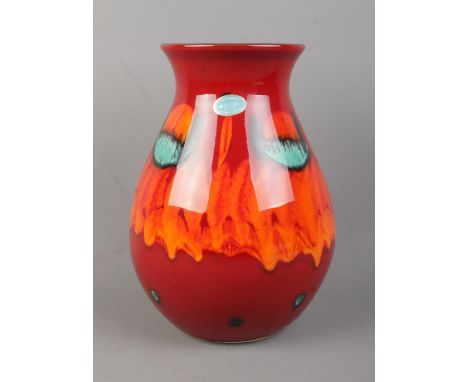 A large Poole pottery Volcano venetian vase. Bearing sticker and impressed marks to the base. 25cm tall.  