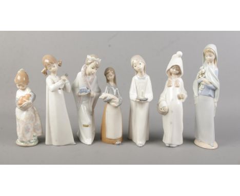 Seven Lladro ceramic figures to include King Gasper and Shepard from a nativity scene, Valencia girl with basket or oranges, 