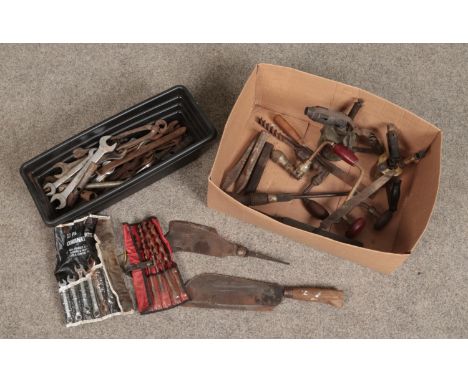 Two boxes of vintage hand tools. Includes billhooks, spanners, blow torches, bits and braces etc.  